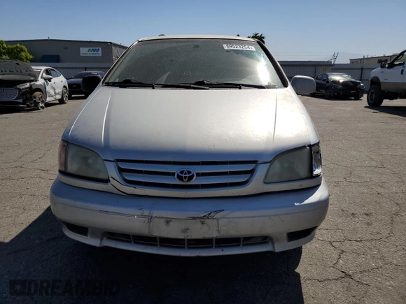 2002 Toyota Sienna LE with VIN 4T3ZF13CX2U458385, listed as a Copart auction lot 69523254 with 187,836 mi miles and Salvage Title. Bid and sale history available at carsss.com. Image 5.