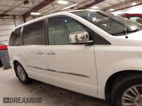 2016 Chrysler Town & Country Touring-L with VIN 2C4RC1CG3GR284527, listed as a IAAI auction lot 41898213 with 198,148 mi miles. Bid and sale history available at carsss.com. Image 14.