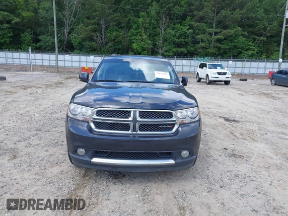 2013 Dodge Durango Crew with VIN 1C4RDHDG7DC657898, listed as a IAAI auction lot 42522353 with 234,483 mi miles and . Bid and sale history available at DreamBid. Image 12.