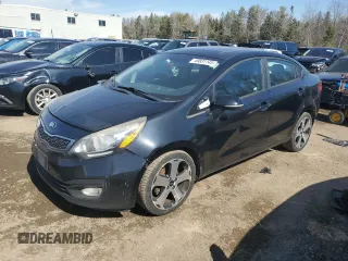 2015 Kia Rio EX with VIN KNADN4A33F6501650, listed as a Copart auction lot 49831145 with 210,007 mi miles and Salvage Title. Bid and sale history available at carsss.com. Image 1.