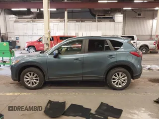 2016 Mazda CX-5 Touring z VIN JM3KE4CY2G0839202, wystawiony jako IAAI lot #41901207 z przebiegiem 65 449 mil mil oraz . Historia ofert i sprzedaży dostępna na DreamBid. Obrazek 15.
