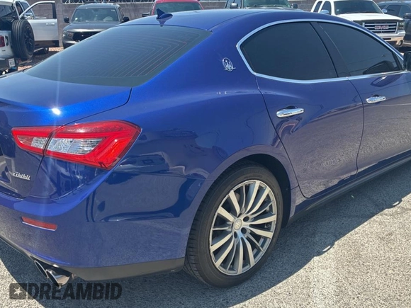 2016 Maserati Ghibli with VIN ZAM57XSA0G1173808, listed as a Copart auction lot 62913645 with 70,097 mi miles and Clean title. Bid and sale history available at DreamBid. Image 4.