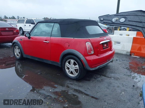 2006 MINI Convertible with VIN WMWRF33526TF64836, listed as a IAAI auction lot 41766880 with 207,094 mi miles and . Bid and sale history available at DreamBid. Image 3.