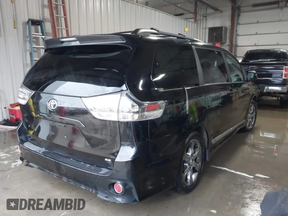 2011 Toyota Sienna SE with VIN 5TDXK3DCXBS067929, listed as a IAAI auction lot 41552044 with 203,697 mi miles. Bid and sale history available at carsss.com. Image 4.