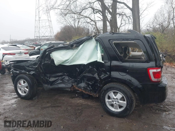 2012 Ford Escape XLS z VIN 1FMCU9C73CKB34021, wystawiony jako IAAI lot #40971529 z przebiegiem Nie podano mil oraz . Historia ofert i sprzedaży dostępna na DreamBid. Obrazek 13.