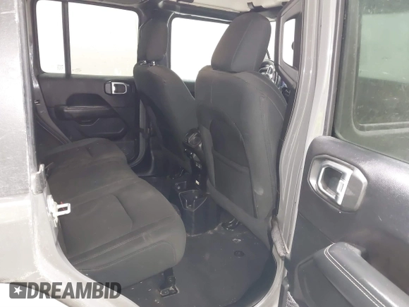2019 Jeep Wrangler Unlimited Sahara with VIN 1C4HJXEG9KW656454, listed as a IAAI auction lot 41648236 with 75,403 mi miles and . Bid and sale history available at DreamBid. Image 8.
