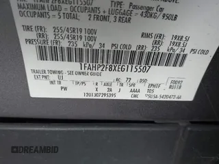 2014 Ford Taurus Limited with VIN 1FAHP2F8XEG115507, listed as a IAAI auction lot 42479603 with 160,986 mi miles and . Bid and sale history available at DreamBid. Image 9.