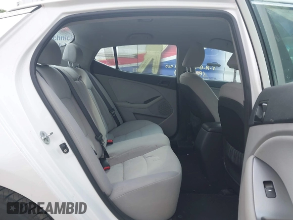 2015 Kia Optima LX with VIN KNAGM4A79F5555866, listed as a IAAI auction lot 42223745 with 115,504 mi miles and . Bid and sale history available at DreamBid. Image 8.