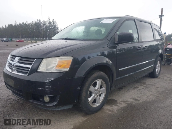 2009 Dodge Grand Caravan SXT z VIN 2D8HN54119R569142, wystawiony jako IAAI lot #42000421 z przebiegiem 161 717 mil mil oraz . Historia ofert i sprzedaży dostępna na DreamBid. Obrazek 2.
