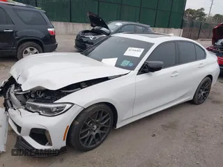 2020 BMW 3 Series M340i with VIN WBA5U7C0XLA232275, listed as a IAAI auction lot 41210369 with 56,220 mi miles and . Bid and sale history available at DreamBid. Image 14.