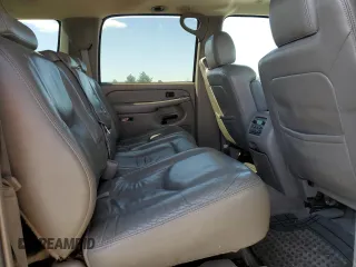 2004 Chevrolet Suburban LT with VIN 3GNFK16T24G168520, listed as a Copart auction lot 64969795 with 215,145 mi miles and Salvage title. Bid and sale history available at DreamBid. Image 11.