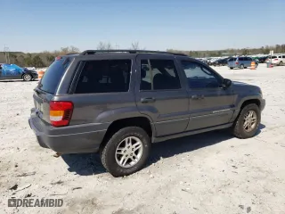 2003 Jeep Grand Cherokee Laredo with VIN 1J4GW48SX3C589100, listed as a Copart auction lot 49986745 with 247,687 mi miles and Salvage Title. Bid and sale history available at carsss.com. Image 3.