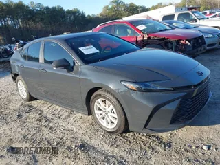 2025 Toyota Camry LE with VIN 4T1DAACK6SU013957, listed as a IAAI auction lot 41500800 with 31,414 mi miles and . Bid and sale history available at DreamBid. Image 1.