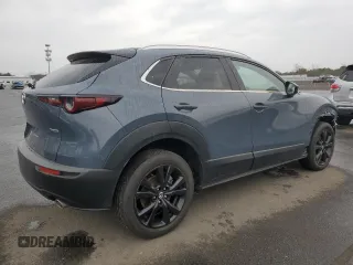 2023 Mazda CX-30 S Carbon Edition with VIN 3MVDMBCM5PM556195, listed as a Copart auction lot 47013945 with 15,223 mi miles and Salvage Title. Bid and sale history available at DreamBid. Image 3.