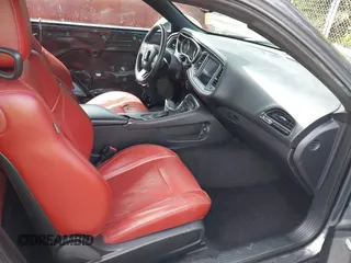 2018 Dodge Challenger SXT z VIN 2C3CDZAG1JH143140, wystawiony jako IAAI lot #42289674 z przebiegiem 79 764 mil mil oraz . Historia ofert i sprzedaży dostępna na DreamBid. Obrazek 5.