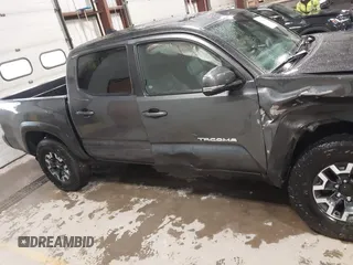 2021 Toyota Tacoma SR z VIN 3TMCZ5AN2MM444249, wystawiony jako IAAI lot #41942146 z przebiegiem 59 429 mil mil oraz . Historia ofert i sprzedaży dostępna na DreamBid. Obrazek 14.