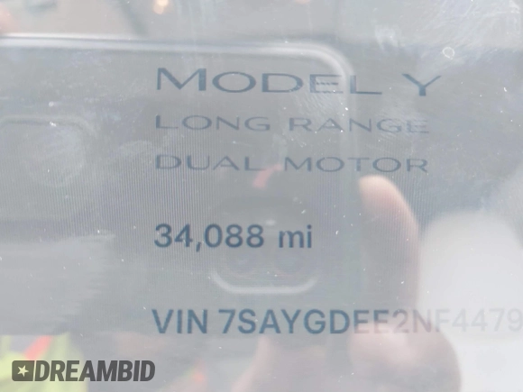2022 Tesla Model Y Long Range z VIN 7SAYGDEE2NF447998, wystawiony jako IAAI lot #41704968 z przebiegiem 34 088 mil mil oraz . Historia ofert i sprzedaży dostępna na DreamBid. Obrazek 15.