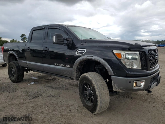 2017 Nissan Titan XD PRO-4X with VIN 1N6BA1F43HN555395, listed as a Copart auction lot 71322364 with 122,826 mi miles and Salvage Title. Bid and sale history available at carsss.com. Image 4.