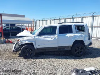 2014 Jeep Patriot Sport with VIN 1C4NJPBA9ED889186, listed as a IAAI auction lot 41738524 with 159,755 mi miles. Bid and sale history available at carsss.com. Image 14.