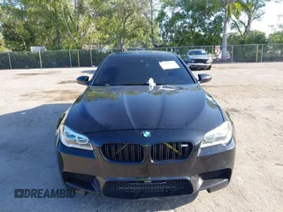 2014 BMW M5 z VIN WBSFV9C54ED593281, wystawiony jako IAAI lot #42063656 z przebiegiem 104 517 mil mil oraz . Historia ofert i sprzedaży dostępna na DreamBid. Obrazek 6.
