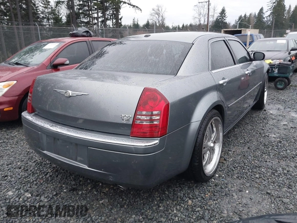 2006 Chrysler 300 C with VIN 2C3KA63H06H286676, listed as a IAAI auction lot 41231230 with 134,565 mi miles. Bid and sale history available at carsss.com. Image 4.