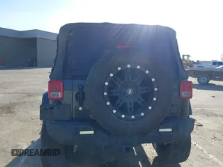 2011 Jeep Wrangler Sahara with VIN 1J4AA5D14BL514060, listed as a IAAI auction lot 41142809 with Not Provided miles and . Bid and sale history available at DreamBid. Image 12.