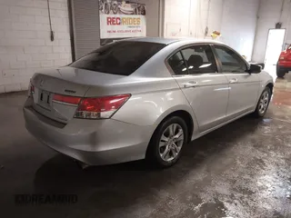 2012 Honda Accord SE z VIN 1HGCP2F63CA096366, wystawiony jako IAAI lot #41325753 z przebiegiem 146 559 mil mil oraz . Historia ofert i sprzedaży dostępna na DreamBid. Obrazek 4.