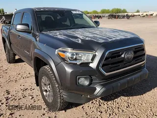 2018 Toyota Tacoma SR5 с VIN 3TMAZ5CN5JM066282, выставлен на аукционе Copart как лот 61197145 с пробегом 85 916 миль миль и Списание • Salvage title. История ставок и продаж доступна на DreamBid. Изображение 13.