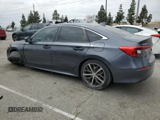 2022 Honda Civic Touring z VIN 2HGFE1F93NH314236, wystawiony jako Copart lot #53380915 z przebiegiem 25 302 mil mil oraz Szkoda całkowita • Salvage title. Historia ofert i sprzedaży dostępna na DreamBid. Obrazek 2.