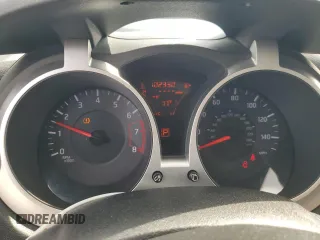 2013 Nissan Juke SL z VIN JN8AF5MV7DT207192, wystawiony jako Copart lot #53837415 z przebiegiem 102 930 mil mil oraz Szkoda całkowita • Salvage title. Historia ofert i sprzedaży dostępna na DreamBid. Obrazek 9.