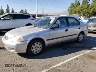 1999 Honda Civic LX with VIN 2HGEJ6571XH552867, listed as a Copart auction lot 81715654 with 234,544 mi miles and Salvage Title. Bid and sale history available at carsss.com. Image 1.