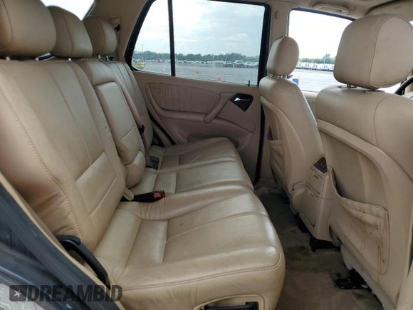 2001 Mercedes-Benz M 320/430/500 with VIN 4JGAB54E41A272057, listed as a Copart auction lot 58197965 with 150,829 mi miles and Salvage title. Bid and sale history available at DreamBid. Image 11.