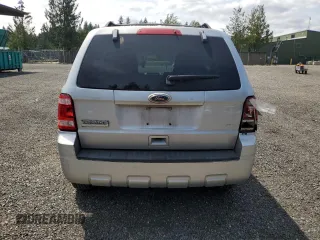 2011 Ford Escape XLS z VIN 1FMCU0C75BKA71501, wystawiony jako Copart lot #62614335 z przebiegiem 130 210 mil mil oraz Szkoda całkowita • Salvage title. Historia ofert i sprzedaży dostępna na DreamBid. Obrazek 6.