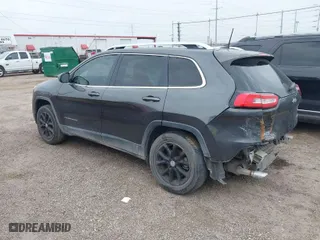 2016 Jeep Cherokee 75th Anniversary with VIN 1C4PJLCB9GW166857, listed as a IAAI auction lot 41435610 with 130,856 mi miles. Bid and sale history available at carsss.com. Image 3.