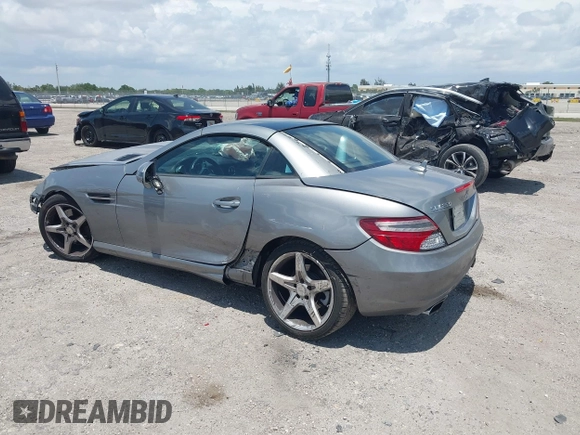 2014 Mercedes-Benz SLK 250 with VIN WDDPK4HA7EF092618, listed as a IAAI auction lot 42150470 with 52,727 mi miles and . Bid and sale history available at DreamBid. Image 3.