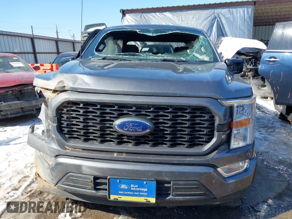 2021 Ford F-150 XL z VIN 1FTEW1C51MFC94173, wystawiony jako IAAI lot #41628222 z przebiegiem 23 266 mil mil oraz . Historia ofert i sprzedaży dostępna na DreamBid. Obrazek 13.