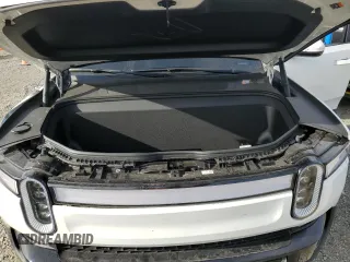 2024 Rivian R1S Adventure z VIN 7PDSGABA4RN043975, wystawiony jako Copart lot #41524615 z przebiegiem 6 807 mil mil oraz Szkoda całkowita • Salvage title. Historia ofert i sprzedaży dostępna na DreamBid. Obrazek 14.