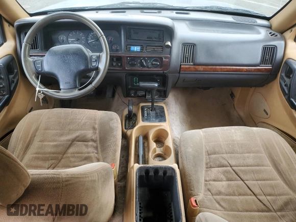 1996 Jeep Grand Cherokee Laredo with VIN 1J4GZ58S6TC165636, listed as a Copart auction lot 51485235 with 266,873 mi miles and Salvage Title. Bid and sale history available at carsss.com. Image 8.