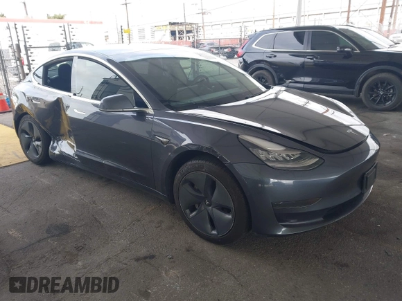 2020 Tesla Model 3 Standard Range Plus with VIN 5YJ3E1EA8LF743405, listed as a IAAI auction lot 41923592 with 81,901 mi miles. Bid and sale history available at carsss.com. Image 1.