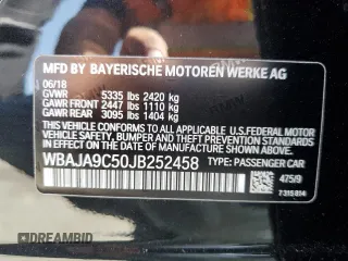 2018 BMW 5 Series 530e with VIN WBAJA9C50JB252458, listed as a Copart auction lot 58697585 with 89,050 mi miles and Salvage title. Bid and sale history available at DreamBid. Image 13.