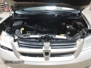 2008 Dodge Grand Caravan SE with VIN 1D8HN44H78B148885, listed as a IAAI auction lot 41942393 with 189,697 mi miles and . Bid and sale history available at DreamBid. Image 10.