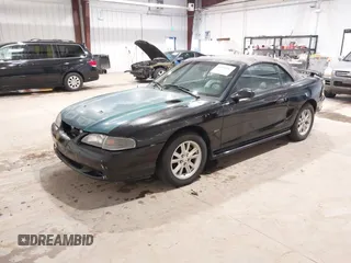 1998 Ford Mustang GT with VIN 1FAFP45X5WF249652, listed as a IAAI auction lot 41830267 with 210,192 mi miles. Bid and sale history available at carsss.com. Image 2.