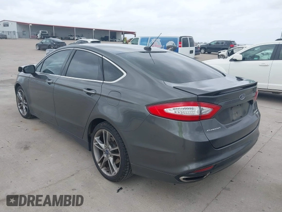 2015 Ford Fusion Titanium with VIN 3FA6P0K95FR181919, listed as a IAAI auction lot 41744443 with 127,572 mi miles. Bid and sale history available at carsss.com. Image 3.