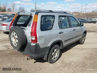 2003 Honda CR-V LX with VIN SHSRD78583U136394, listed as a IAAI auction lot 41701109 with 167,435 mi miles. Bid and sale history available at carsss.com. Image 12.