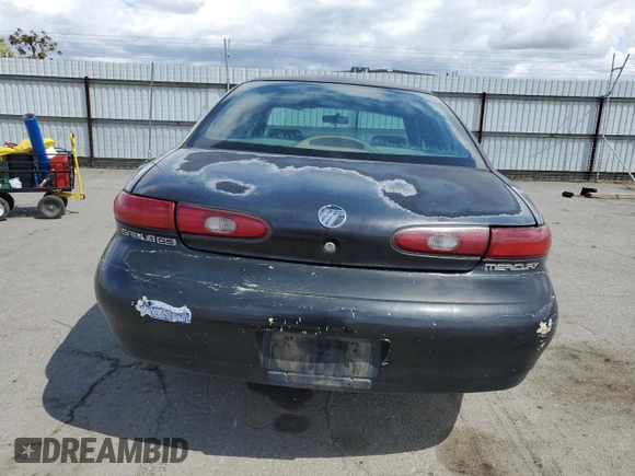 1997 Mercury Sable GS z VIN 1MELM50U1VA620597, wystawiony jako Copart lot #51635765 z przebiegiem 250 824 mil mil oraz Szkoda całkowita • Salvage title. Historia ofert i sprzedaży dostępna na DreamBid. Obrazek 6.