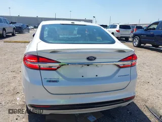 2017 Ford Fusion Titanium with VIN 3FA6P0SUXHR147336, listed as a IAAI auction lot 41873106 with 103,247 mi miles and . Bid and sale history available at DreamBid. Image 16.