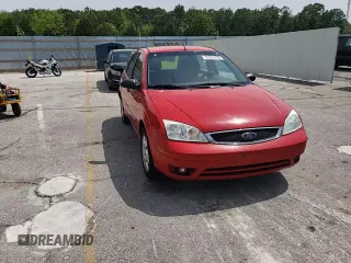 2007 Ford Focus S z VIN 1FAHP37N47W245222, wystawiony jako Copart lot #57293025 z przebiegiem 102 552 mil mil oraz Szkoda całkowita • Salvage title. Historia ofert i sprzedaży dostępna na DreamBid. Obrazek 13.