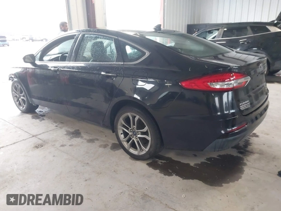 2019 Ford Fusion SEL with VIN 3FA6P0CD2KR260770, listed as a IAAI auction lot 41564261 with 108,818 mi miles and . Bid and sale history available at DreamBid. Image 3.