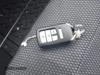 2019 Honda Civic Sport with VIN 2HGFC2F80KH602942, listed as a IAAI auction lot 41785234 with 82,661 mi miles and . Bid and sale history available at DreamBid. Image 11.