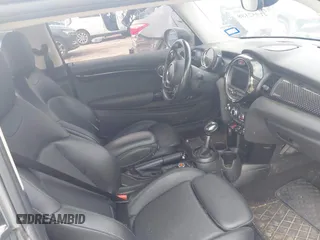 2019 MINI Hardtop Cooper S z VIN WMWXP7C56K2A49415, wystawiony jako IAAI lot #41952188 z przebiegiem 143 633 mil mil oraz . Historia ofert i sprzedaży dostępna na DreamBid. Obrazek 5.